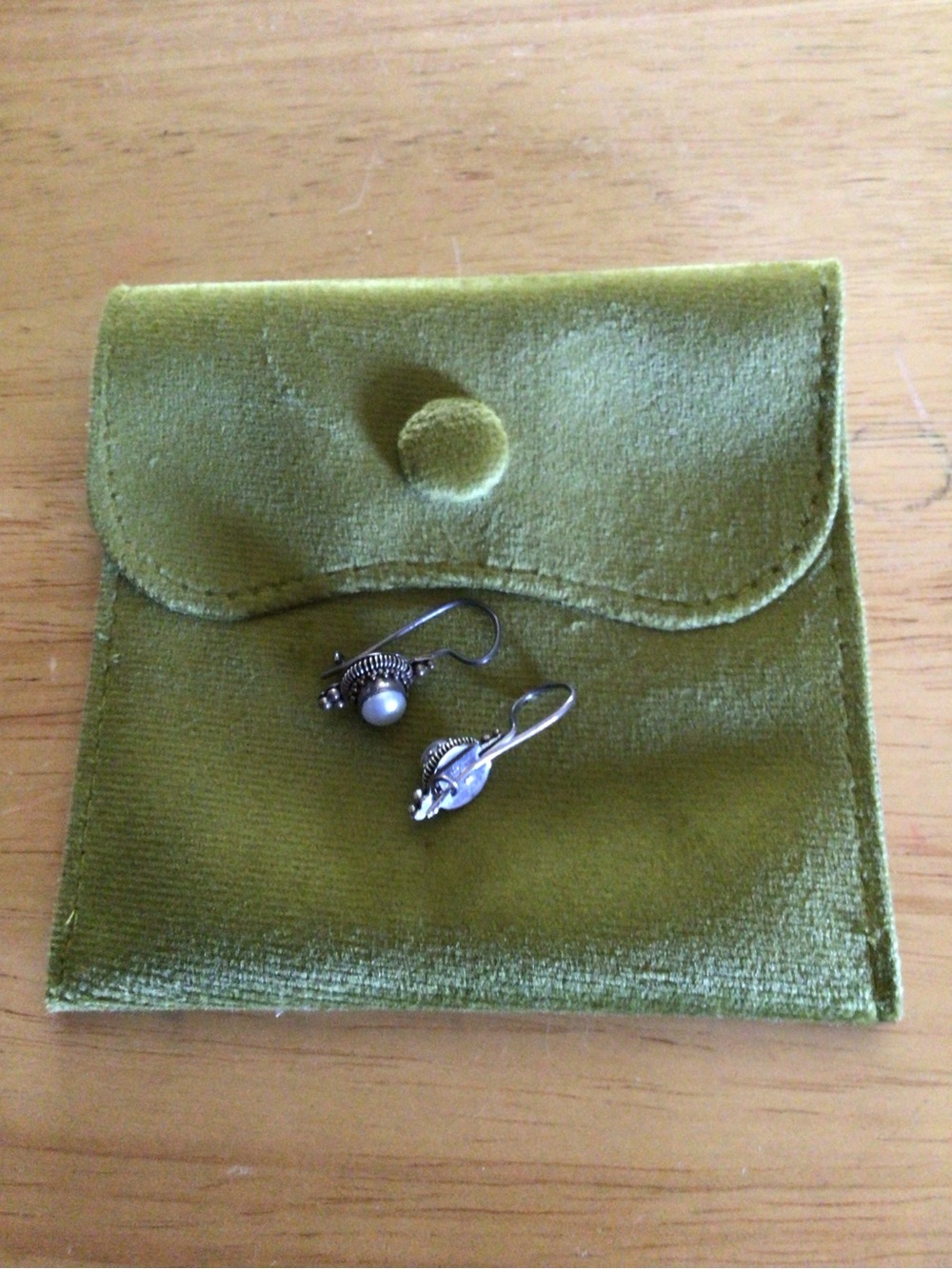 Source Unknown Silver Pearl Drop Earrings on Green Pouch